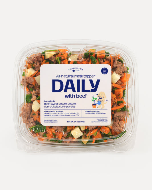 Packaged all-natural meal dog food topper with beef on a white background